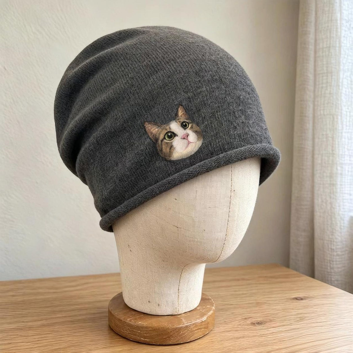 Custom wool-felt pet portrait hat on mannequin